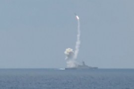 Still image shows Russian warship firing cruise missiles at Syrian targets