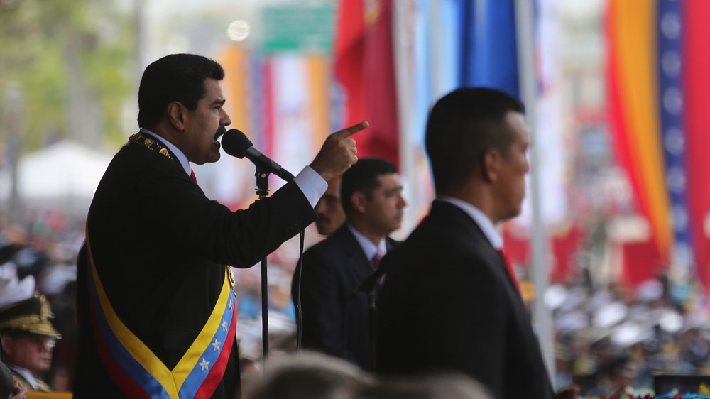 Venezuelan President Nicolas Maduro speaks before a parade marking the first anniversary of Hugo Chavez's death on March 5, 2014, in Caracas, Venezuela [John Moore/Getty Images]