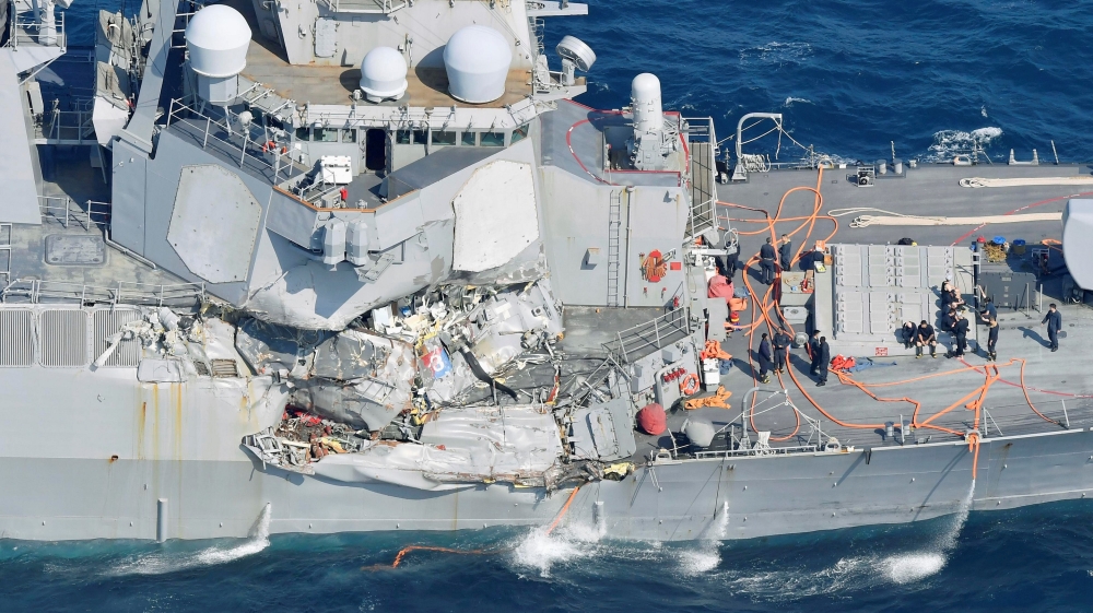 The collision occurred when most of the 200 crew members were asleep [Kyodo/Reuters]