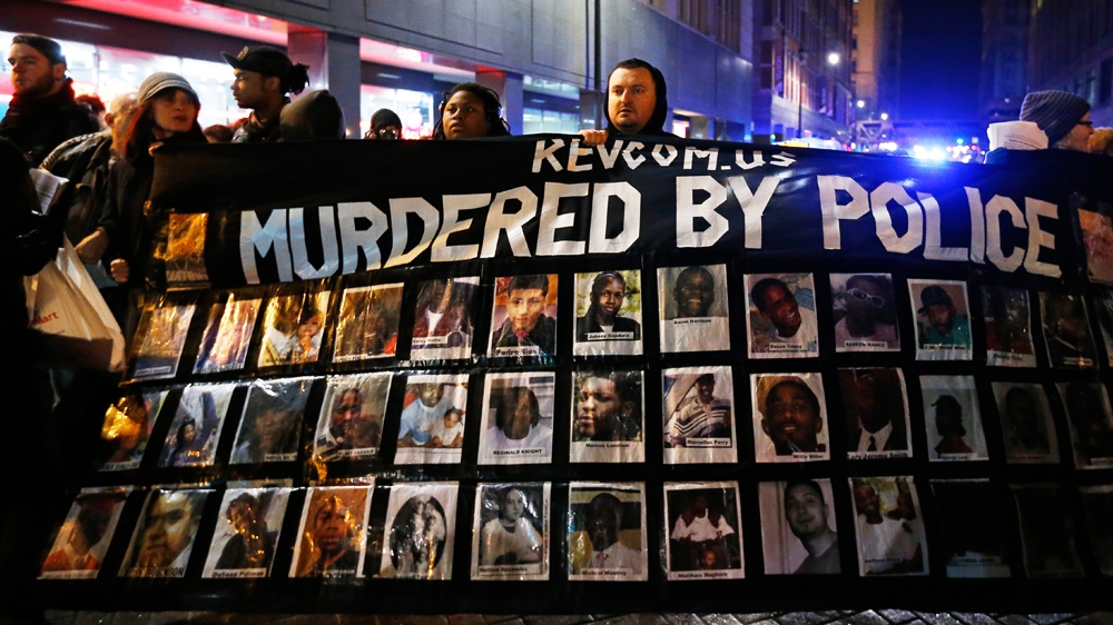 More than 1,000 people were killed by US police last year [Jim Young/Reuters]