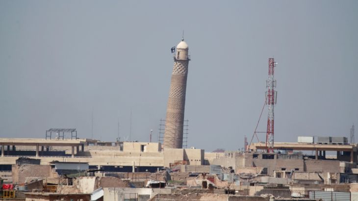 A flag of Islamic State militants is seen on top of Mosul''s Al-Hadba minaret at the Grand Mosque in Mosul
