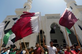 Palestinians take part in a rally in support of Qatar, inside Qatari-funded construction project ''Hamad City'', in the southern Gaza Strip