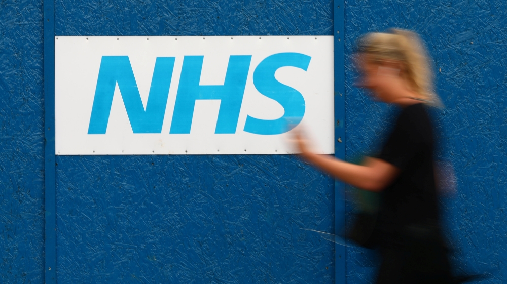 Critics warn a lack of funds will put more pressure on the NHS as demand for its services grows [Neil Hall/Reuters]