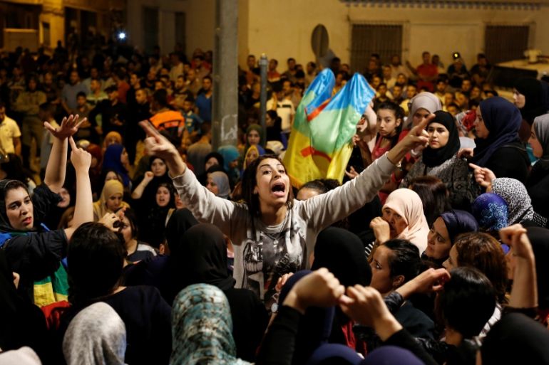 Women shout during a protest against official abuses and corruption in the town of Al-Hoceima