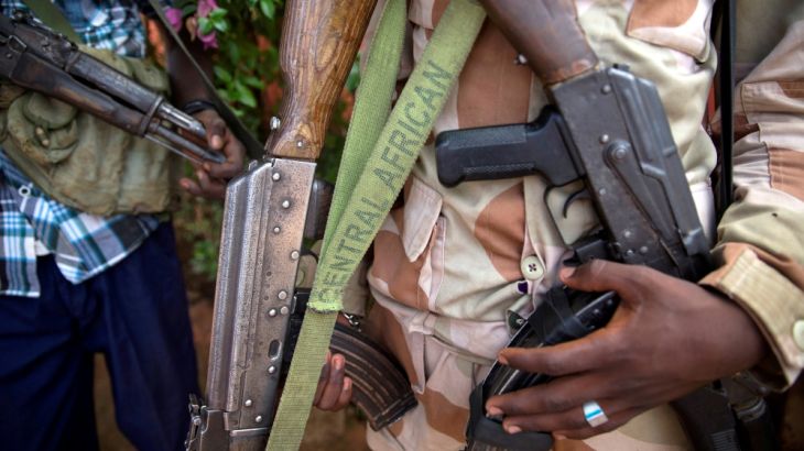 FILE PHOTO: An armed fighter belonging to the 3R armed militia displays his weapon in the town of Koui, Central African Republic