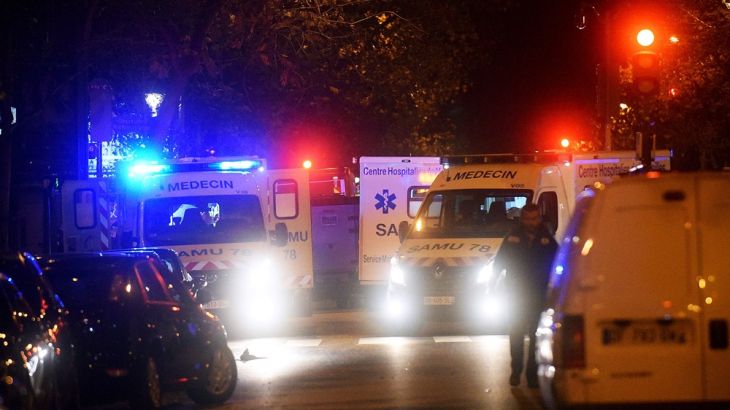 Ambulances are parked near the Bataclan