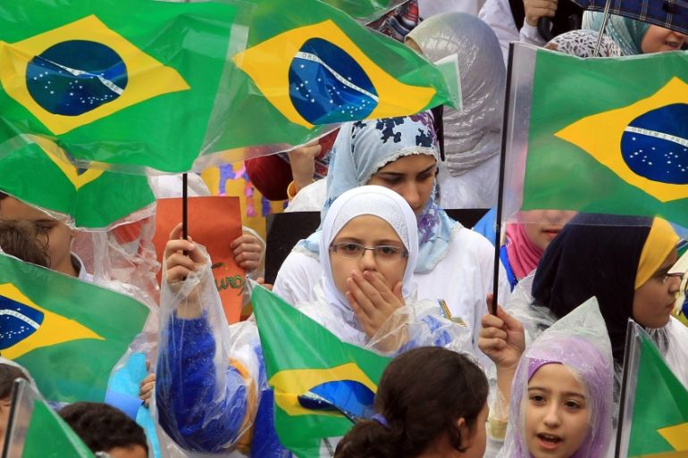 Muslim children protest against an anti-Islam film made in U.S. and cartoons mocking Prophet Mohammad published in a French magazine, in Sao Paulo