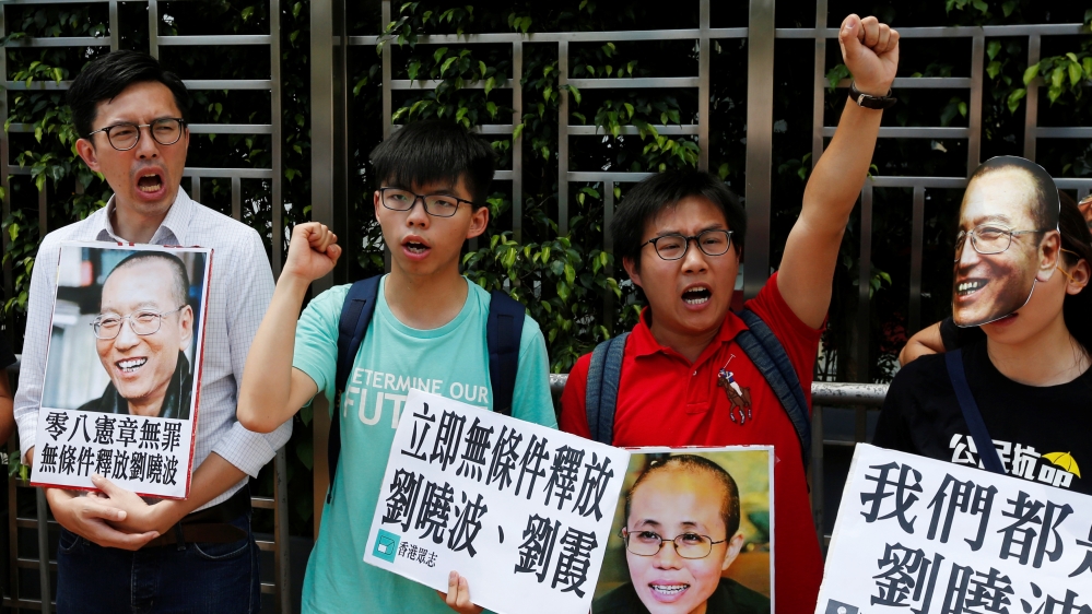 Dozens protested in Hong Kong on Tuesday over Liu's treatment in prison [Bobby Yip/Reuters]