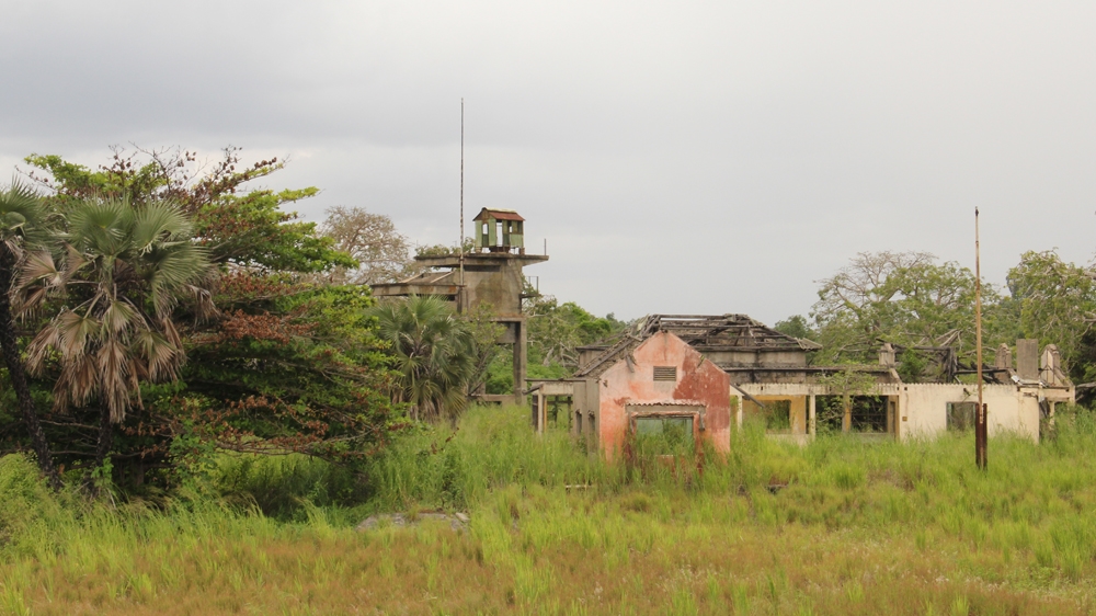 
An abandoned watchtower Boulambemba island from Congo's colonial days [William Clowes/Al Jazeera]
