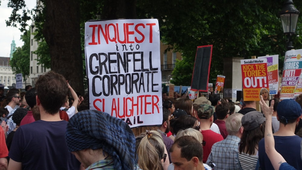 Many on the left say the Grenfell Tower fire has come to symbolise austerity [Shafik Mandhai/Al Jazeera]
