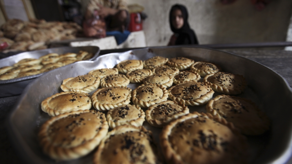 Traditional Yemeni sweets are an essential part of Ramadan nights [Mohamed al-Sayaghi/Reuters]