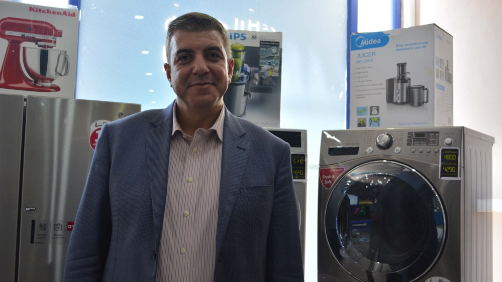 Tareq Al Saqqa is the general manager of Al Saqqa Co. for appliances in Gaza City [Mersiha Gadzo/Al Jazeera]