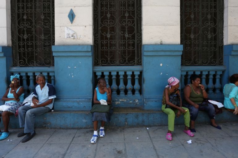 Vendors offer plastic bags for sale near a subsidized state store, or "bodega", where Cubans can buy basic products with a ration book they receive annually from the government, in Havana