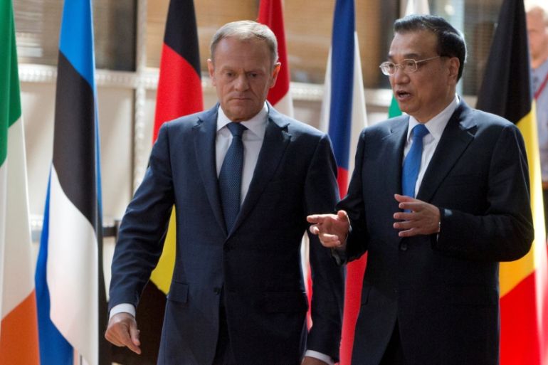 EU Council President Tusk and Chinese Premier Li Keqiang arrive to attend a EU-China Summit in Brussels