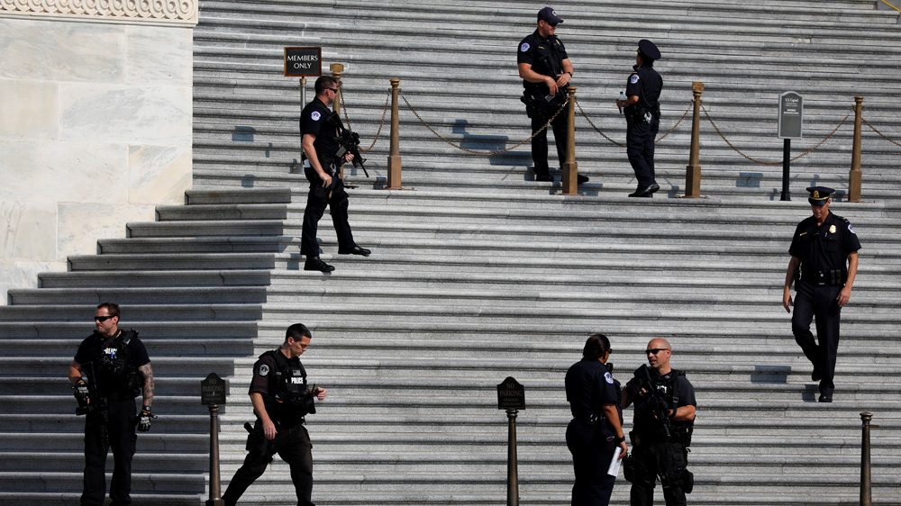 Police keep watch on Capitol Hill following Wednesday's shooting in nearby Alexandria, Virginia [Reuters]