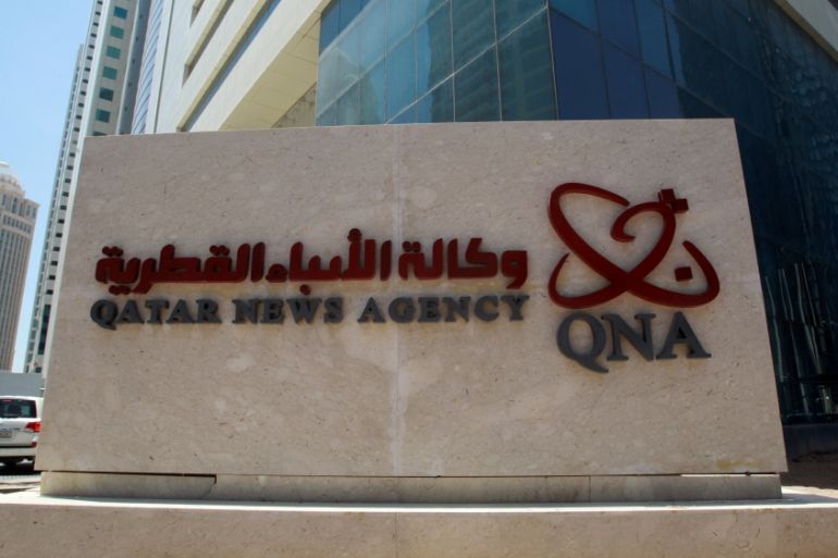 A signboard of Qatar News Agency is seen in Doha