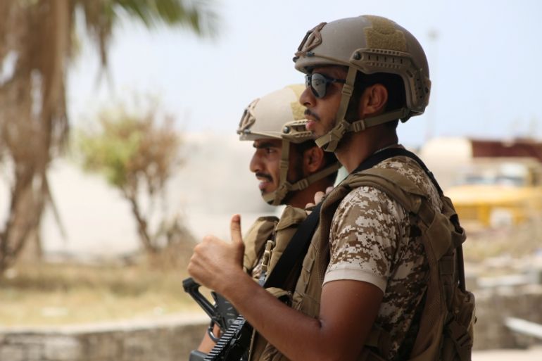 UAE soldiers stand guard in Aden, Yemen