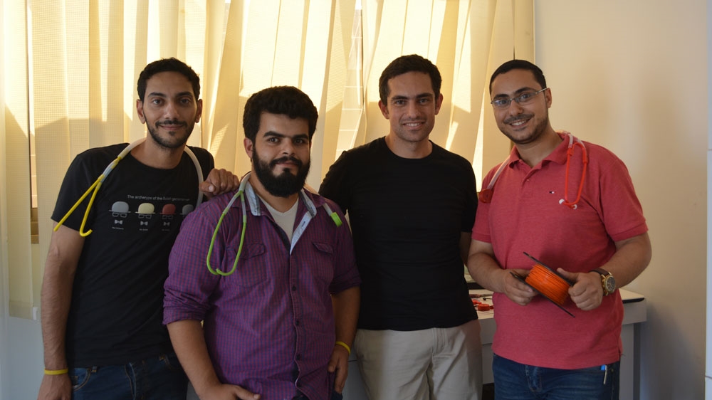 The Glia team includes, from left to right, Shaker Shaheen, Mahmoud Alalawi, Tarek Loubani and Mohammed Abu Matar [Mersiha Gadzo/Al Jazeera]