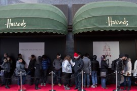 Shoppers queue for the Boxing Day sale at Harrods department store in London