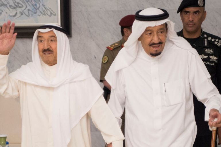 Saudi Arabia''s King Salman bin Abdulaziz Al Saud holds hands with Emir of Kuwait Sabah Al-Ahmad Al-Jaber Al-Sabah in Jeddah