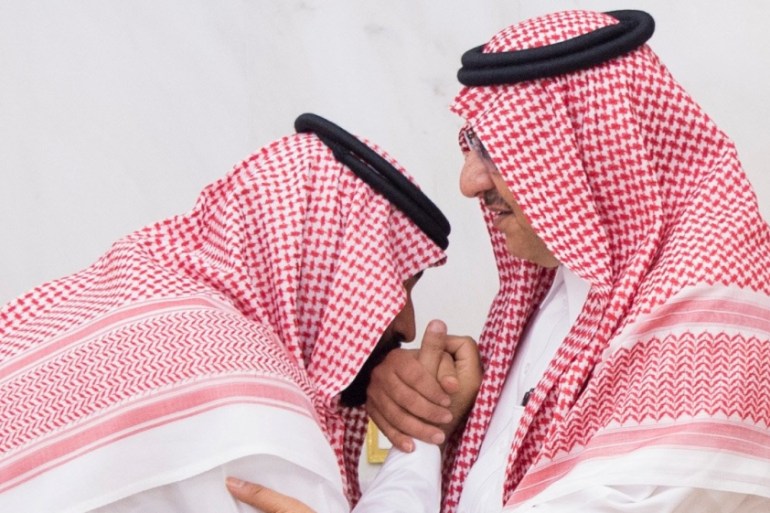 Newly appointed Crown Prince Mohammed bin Salman kisses the hand of Prince Mohammed bin Nayef in Mecca