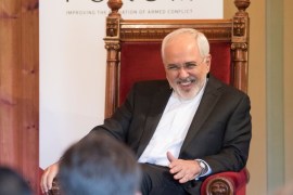 Iran''s FM Zarif smiles during opening of Oslo Forum at Losby Gods outside Oslo