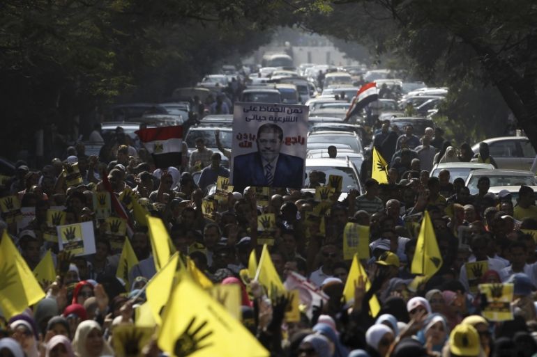 Supporters of ousted Egyptian President Mursi take part in a protest in Cairo