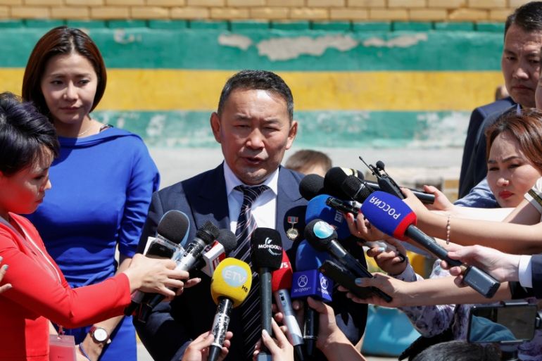 Khaltmaa Battulga, the candidate of the opposition Democratic Party, talks to reporters after voting in the second round of presidential elections in Ulaanbaatar