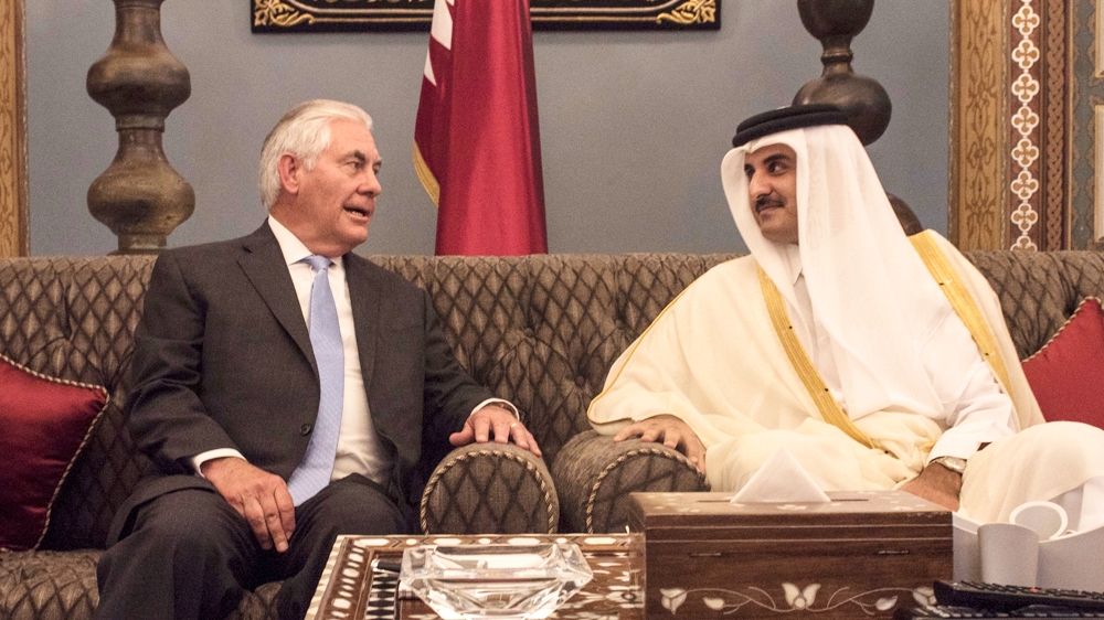 Tillerson first met Qatar's emir Sheikh Tamim Bin Hamad Al Thani before his talks with Qatar's foreign minister on Tuesday [AP]