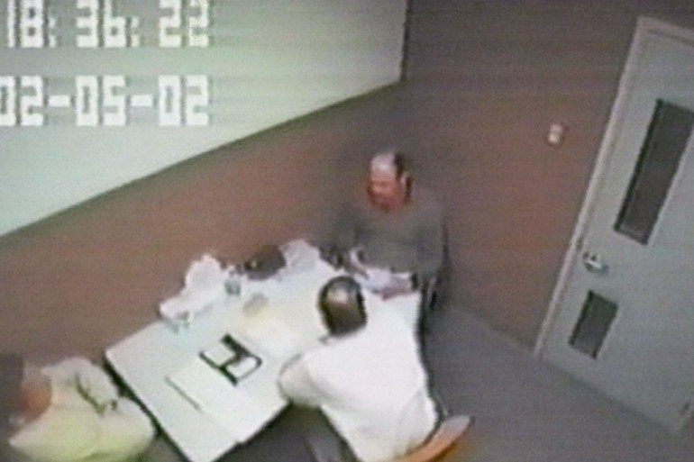 Two police officers interrogate David Westerfield