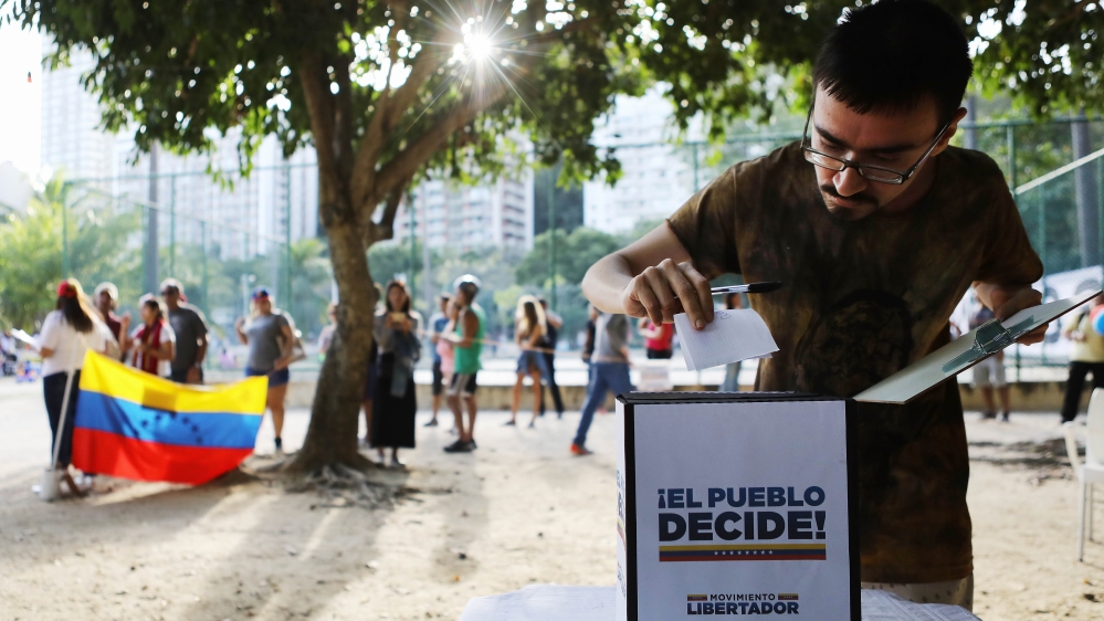 More than a third of Venezuela's 19 million voters rejected Maduro's bid to rewrite the change the constitution [Getty Images]