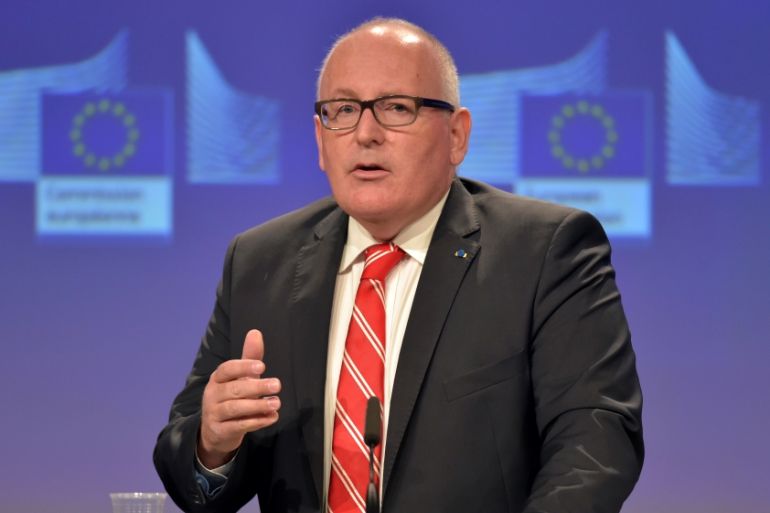 EC First Vice-President Timmermans reacts during a news conference at the European Commission in Brussels