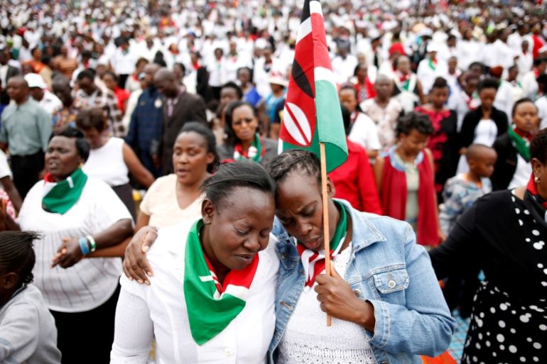Kenyans pray during a rally calling for peace ahead of Kenya''s August 8 election in Nairobi, Kenya