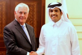 Qatar''s foreign minister Sheikh Mohammed bin Abdulrahman al-Thani (R) shakes hands with U.S. Secretary of State Rex Tillerson following a joint news conference in Doha