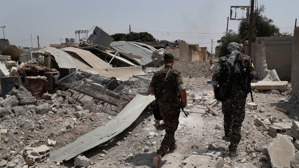 Progress inside Raqqa has been hampered by extensive mining of neighbourhoods [AP]