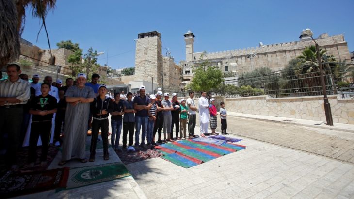 Palestinians attend the Friday prayers of the holy fasting month of Ramadan at al-Ibrahimi mosque, which Jews call the Tomb of the Patriarchs, in Hebron