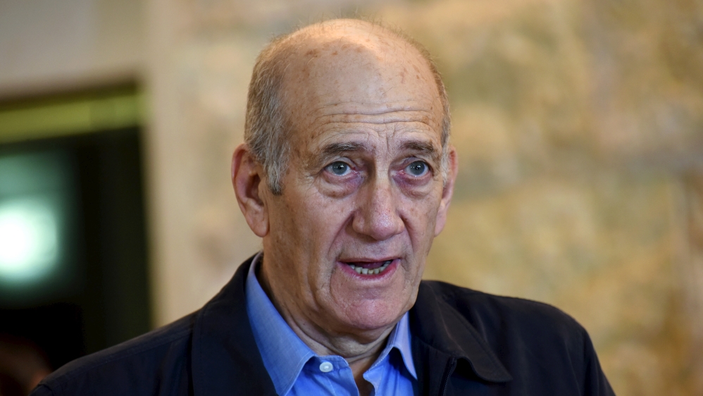 Ehud Olmert is currently serving 18 months in prison [Debbie Hill/Reuters]