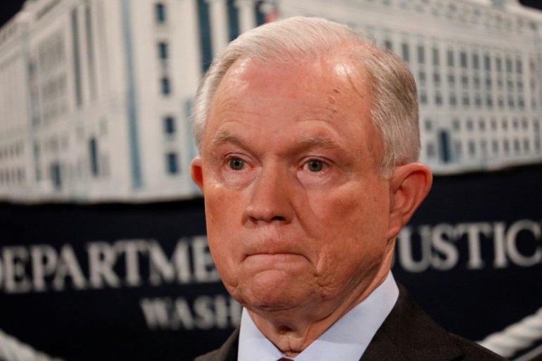 U.S. Attorney General Jeff Sessions looks on during a news conference announcing the takedown of the dark web marketplace AlphaBay, at the Justice Department in Washington