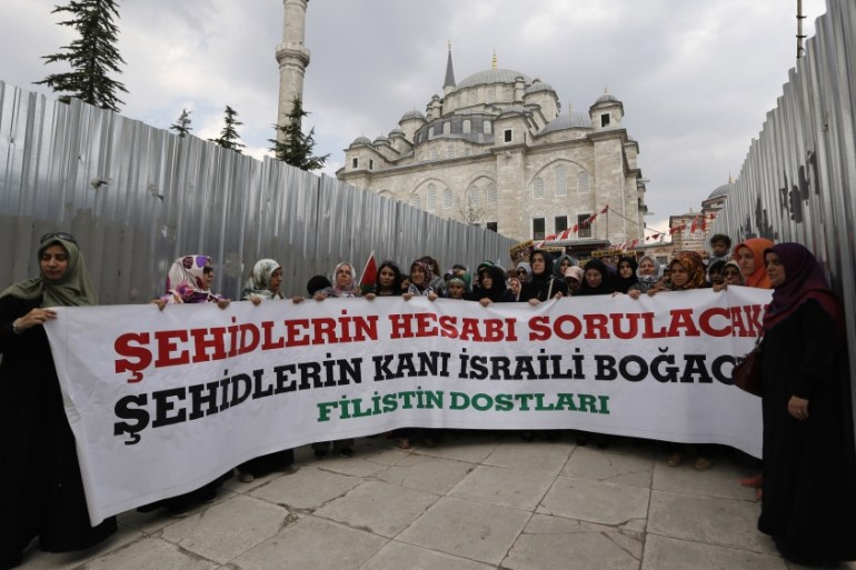 Pro-Palestinian demonstrators protest against Israel''s military action in Gaza, after Friday prayers at the courtyard of Fatih mosque in Istanbul