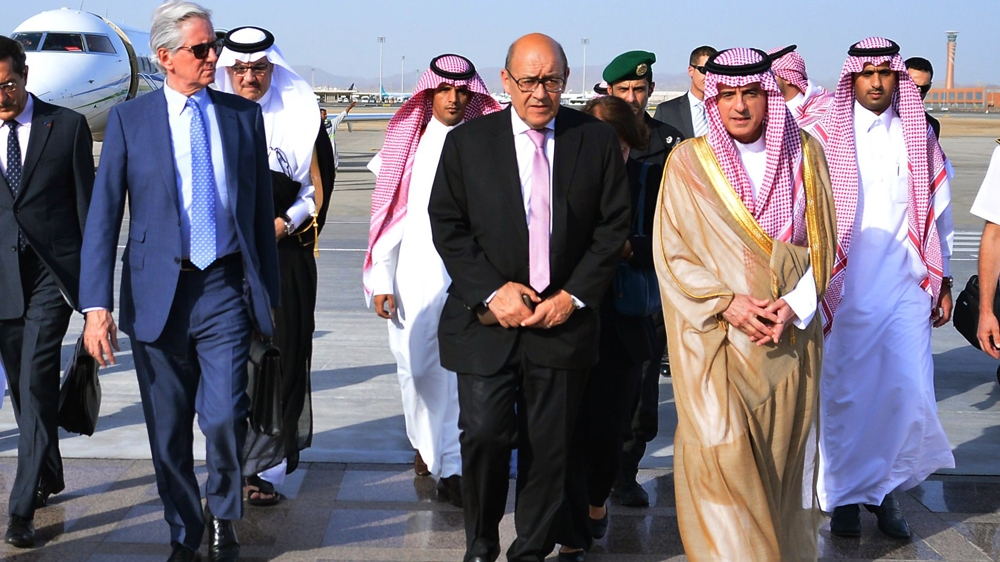 French Foreign Minister Jean-Yves Le Drian, centre, front, visited Saudi Arabia on Sunday to help resolve the Gulf crisis [EPA]