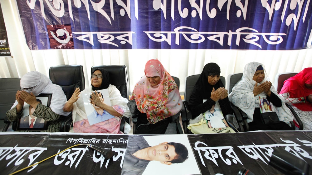 Family members of forced disappearance victims and rights activists praying for their family members at National Press Club, Dhaka [Mahmud Hossain Opu/Al Jazeera]