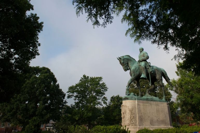 The statue of Confederate Army of Northern Virginia Gen. Robert E. Lee stands in Emancipation Park in Charlottesville
