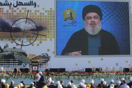Lebanon''s Hezbollah leader Sayyed Hassan Nasrallah speaks via a screen during a rally marking the 11th anniversary of the end of Hezbollah''s 2006 war with Israel, in the southern village of Khiam