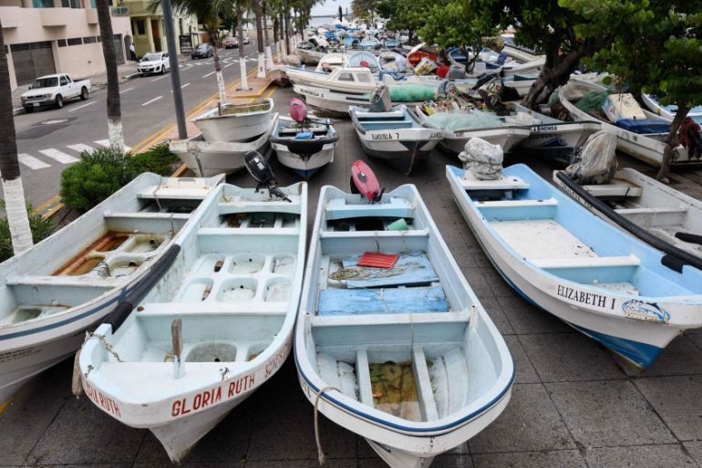 Fishing boats are kept along the street of the port city of Veracruz to protect them from the winds and waves brought by hurricane Franklin. Mexico