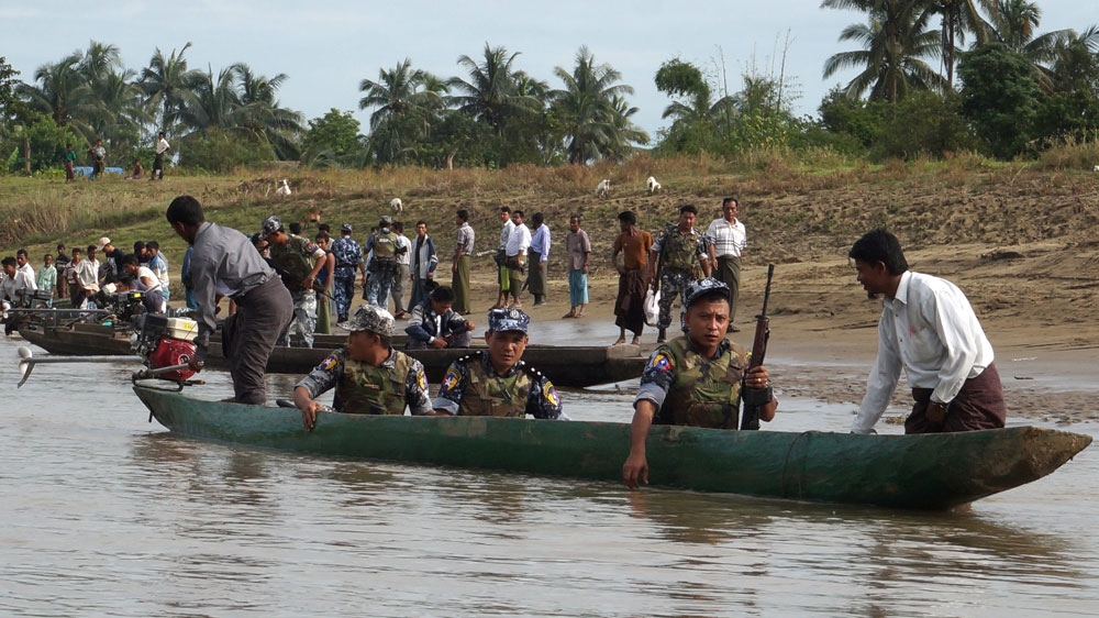 Myanmar border police patrol Buthidaung, an area in northern Rakhine state, near the border with Bangladesh [Reuters File] 