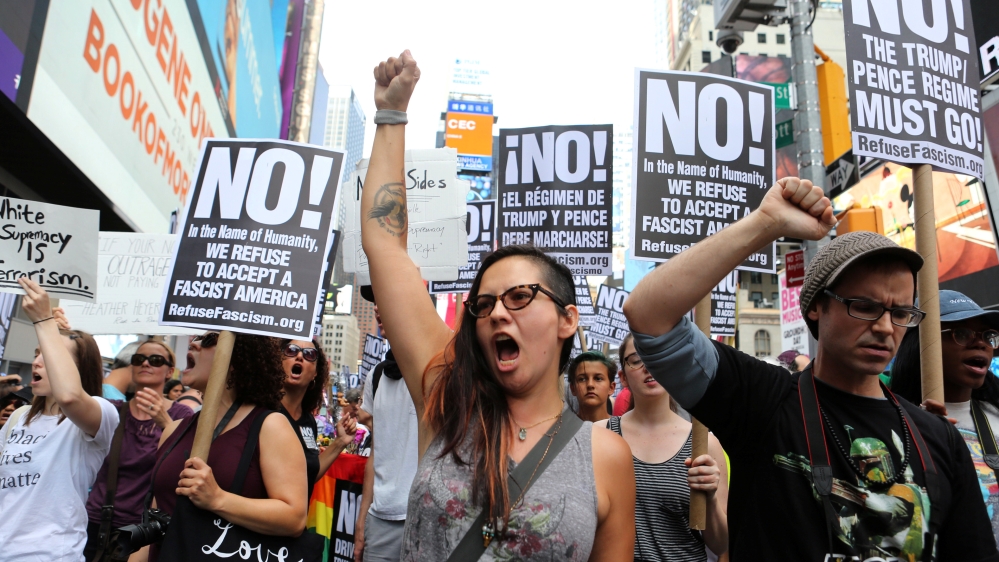 Protesters chant slogans against white supremacy in Times Square, New York City [Joe Penney/Reuters]