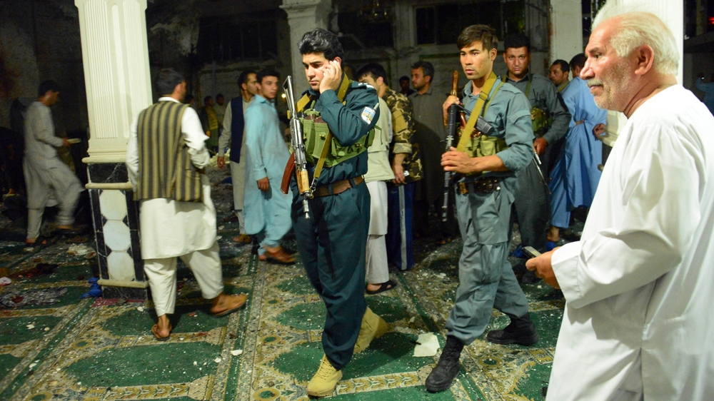 The explosion at the mosque comes a day after an attack on the Iraqi embassy in Kabul [Hoshang Hashimi/AFP]