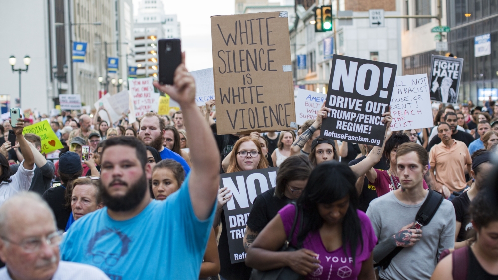 Demonstrators participate in a rally against white supremacy in Philadelphia [Jessica Kourkounis/Getty Images]
