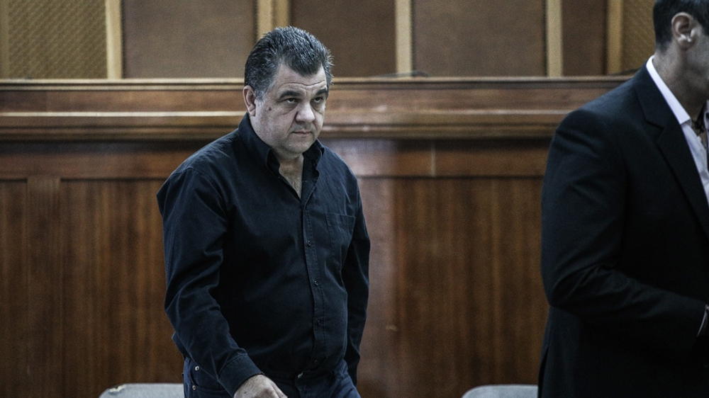 Giorgos Roupakias, who admitted to killing Pavlos Fyssas, photographed in court on October 2, 2015 [Menelaos Myrillas/SOOC/Al Jazeera]