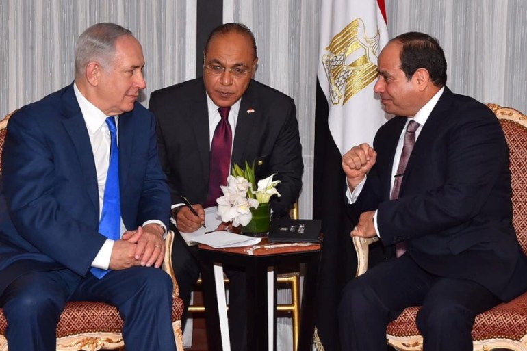 Egyptian President Abdel Fattah al-Sisi speaks with Israeli Prime Minister Benjamin Netanyahu